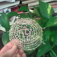 Load image into Gallery viewer, Spring Colors Kippah held against a background of houseplants and books