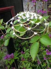 Load image into Gallery viewer, Silver and pearl beaded wire kippah with central crystal in a garden