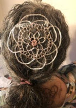 Load image into Gallery viewer, Close-up of a person&#39;s head with a decorative hair accessory featuring a floral design.
