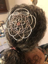 Load image into Gallery viewer, Person with a decorative hairpiece/kippah/yarmulke resembling a dreamcatcher.

