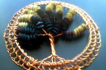 Load image into Gallery viewer, Bright copper wire both forms the tree and the frame of this autumnal kippah. The beads are upcycled from a  broken wooden bracelet, and range in shade from mallard blue to sun kissed light brown. A brown plastic comb (not shown) is attached, but if you prefer clips, let me know when ordering.
