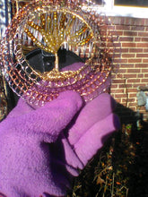 Load image into Gallery viewer, Tree of Life Beaded Wire Kippah held in a purple gloved hand with a black mailbox and a brick wall in the background.
