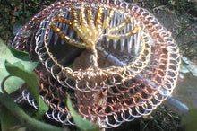 Load image into Gallery viewer, Closeup view of the beaded wire TOL kippah with fuzzy peach, gold and amber beading
