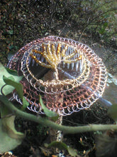 Load image into Gallery viewer, Tree of Life beaded wiire kippah shown on a wire railing with vines in the foreground and background.d
