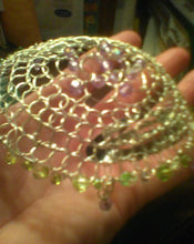 Load image into Gallery viewer, Purple and green beaded kippah resting in palm of hand
