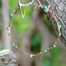 Load image into Gallery viewer, Olive circlet crown displayed on a tree
