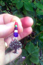 Load image into Gallery viewer, Commercially made tol (Tree of Life) on silver plated ear wires with blue, white, black, green and red glass beads
