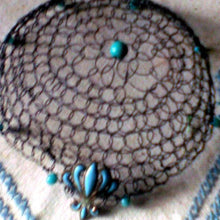 Load image into Gallery viewer, Closeup of black wire kippah with turquoise beading and fleur-de lis charm
